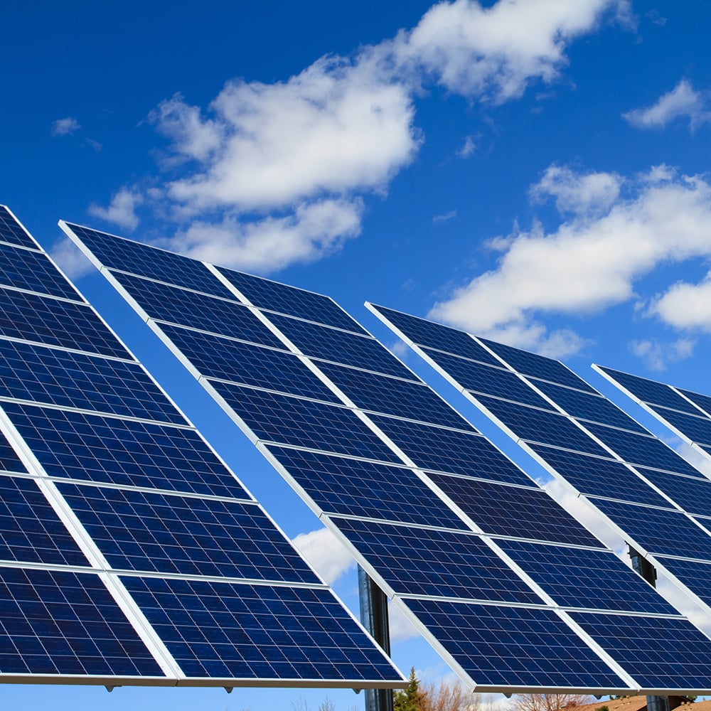 solar electric panels in sunlight on rooftops in Orlando