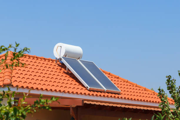 Solar water heating panel and water collector on a house roof